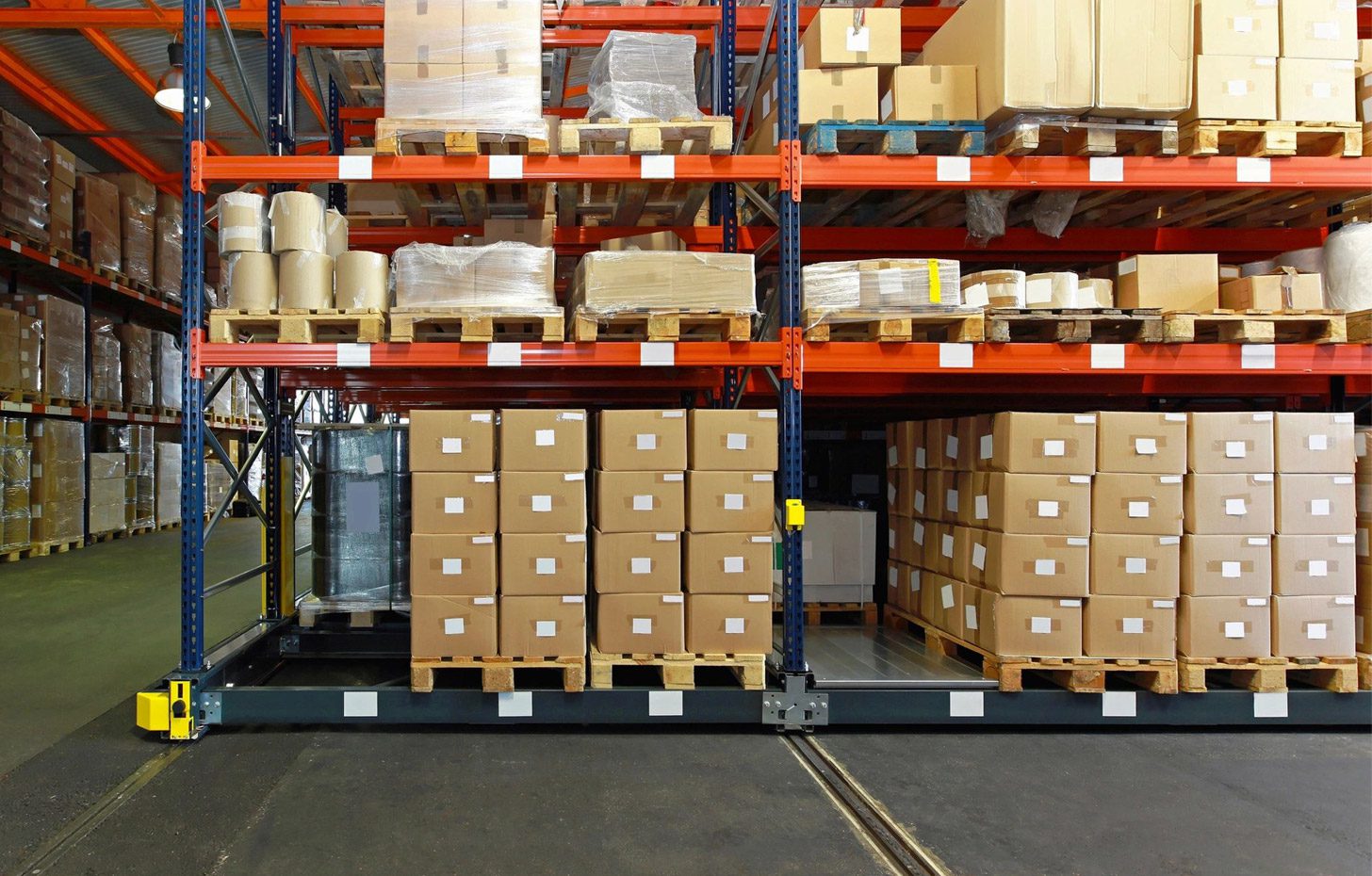 A warehouse filled with boxes and shelves of goods.