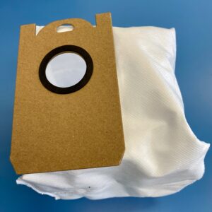 A bag of paper on top of a white cloth.